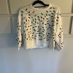 Holiday light bubble sleeve top